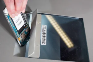 shredding phone in mobile phone shredder